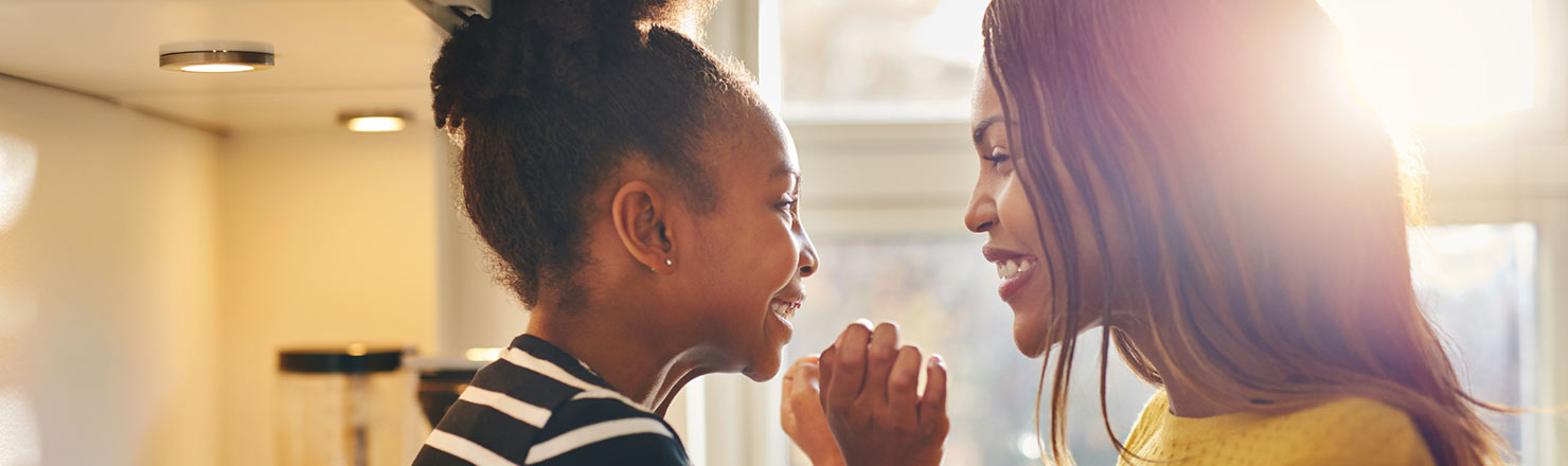 Mother and daughter in kitchen