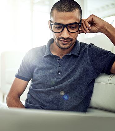 Man looking at laptop